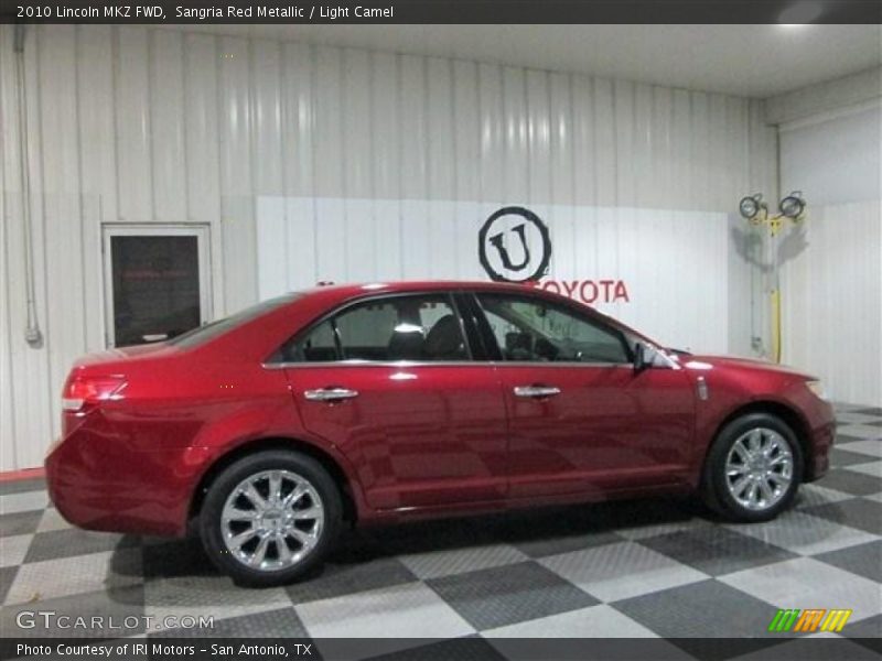 Sangria Red Metallic / Light Camel 2010 Lincoln MKZ FWD