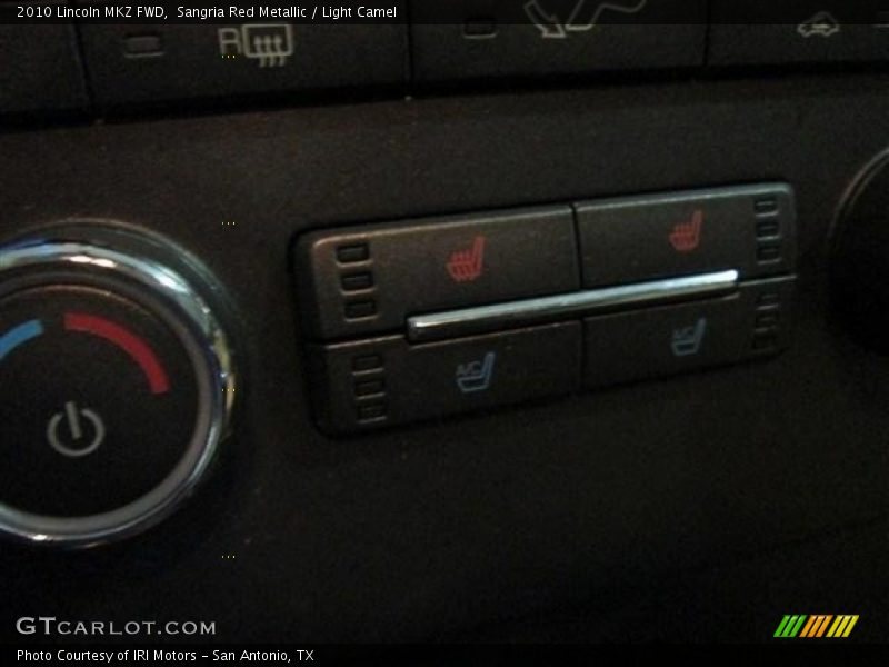 Sangria Red Metallic / Light Camel 2010 Lincoln MKZ FWD
