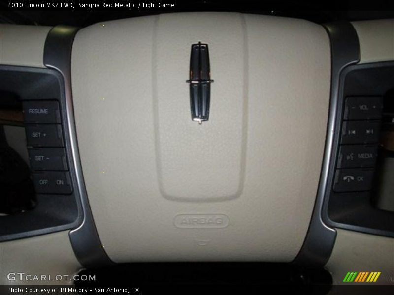 Sangria Red Metallic / Light Camel 2010 Lincoln MKZ FWD