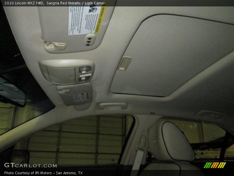 Sangria Red Metallic / Light Camel 2010 Lincoln MKZ FWD