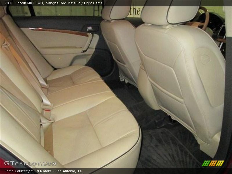 Sangria Red Metallic / Light Camel 2010 Lincoln MKZ FWD
