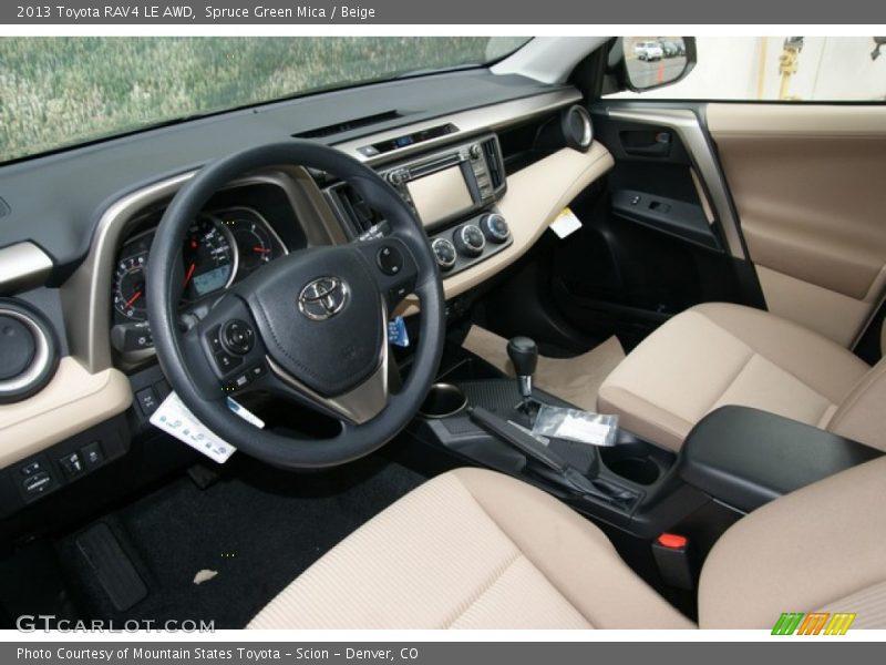 Spruce Green Mica / Beige 2013 Toyota RAV4 LE AWD