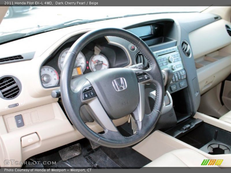 Dark Cherry Pearl / Beige 2011 Honda Pilot EX-L 4WD