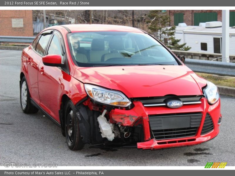 Race Red / Stone 2012 Ford Focus SE SFE Sedan