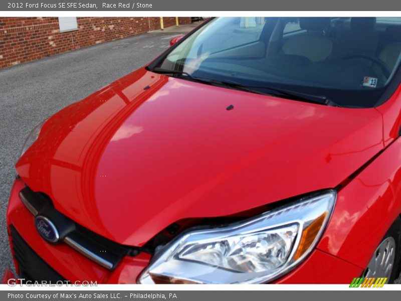 Race Red / Stone 2012 Ford Focus SE SFE Sedan