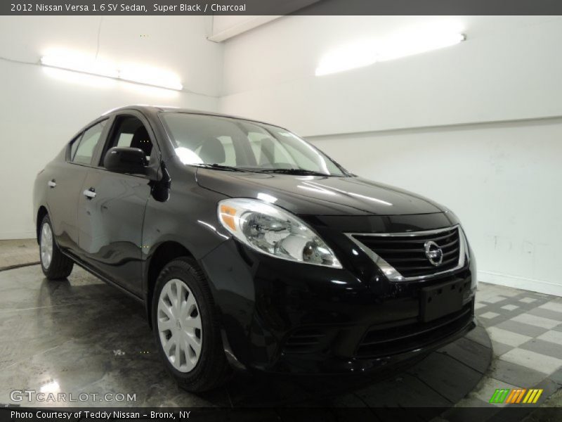 Super Black / Charcoal 2012 Nissan Versa 1.6 SV Sedan