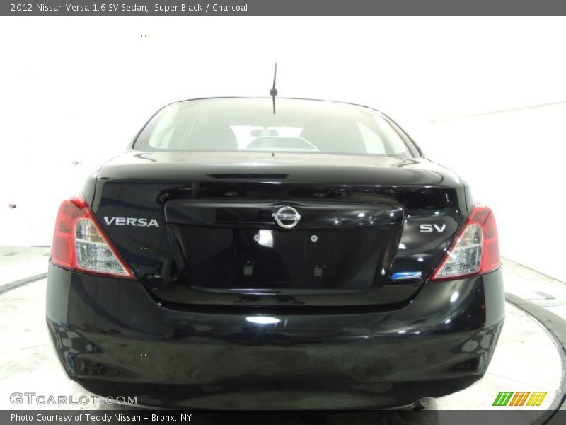 Super Black / Charcoal 2012 Nissan Versa 1.6 SV Sedan