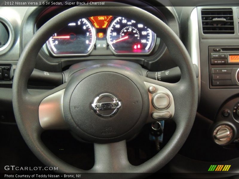 Super Black / Charcoal 2012 Nissan Versa 1.6 SV Sedan