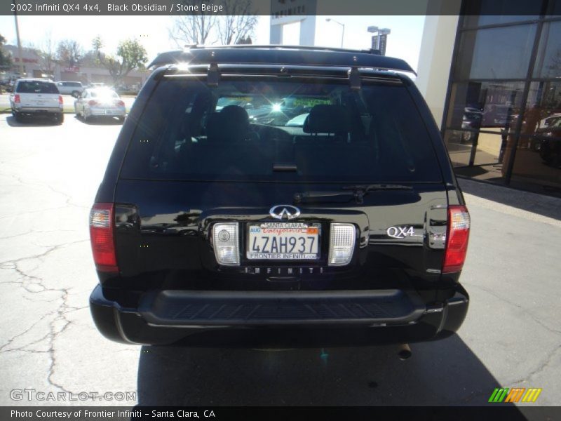 Black Obsidian / Stone Beige 2002 Infiniti QX4 4x4