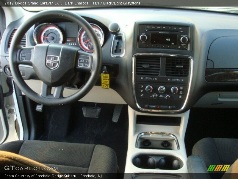 Dark Charcoal Pearl / Black/Light Graystone 2012 Dodge Grand Caravan SXT