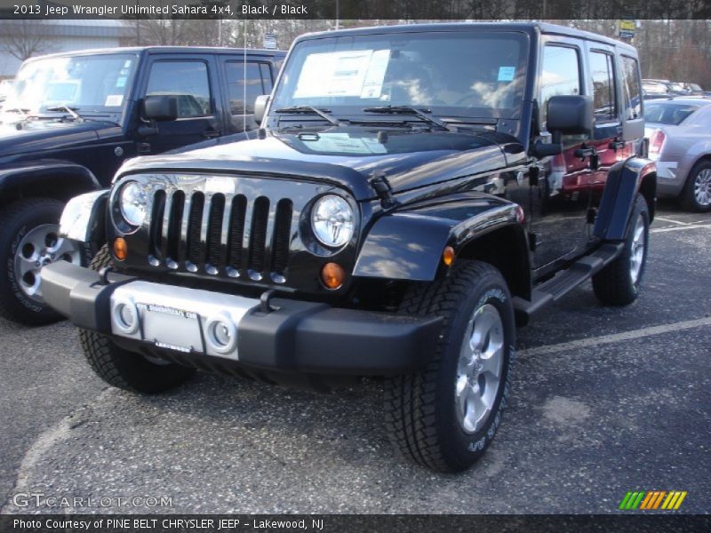 Black / Black 2013 Jeep Wrangler Unlimited Sahara 4x4