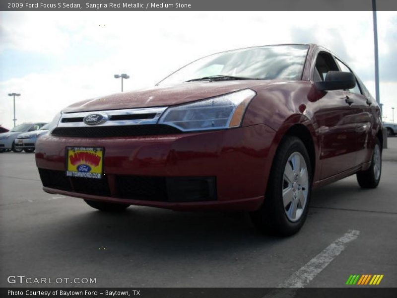 Sangria Red Metallic / Medium Stone 2009 Ford Focus S Sedan