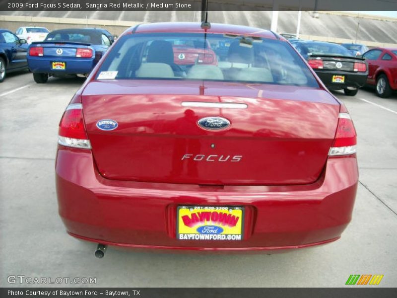 Sangria Red Metallic / Medium Stone 2009 Ford Focus S Sedan