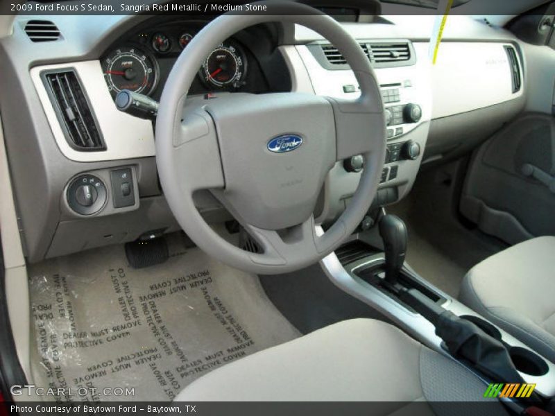 Sangria Red Metallic / Medium Stone 2009 Ford Focus S Sedan