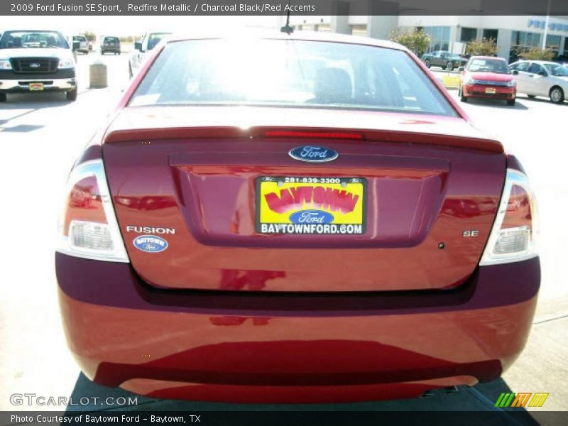Redfire Metallic / Charcoal Black/Red Accents 2009 Ford Fusion SE Sport