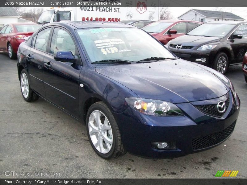 Stormy Blue Mica / Beige 2009 Mazda MAZDA3 i Touring Sedan