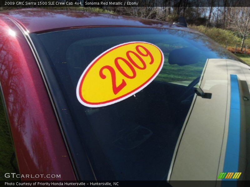 Sonoma Red Metallic / Ebony 2009 GMC Sierra 1500 SLE Crew Cab 4x4