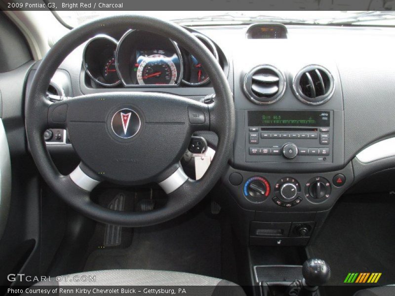 Bright Red / Charcoal 2009 Pontiac G3