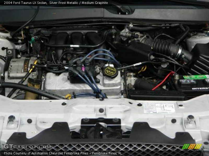 Silver Frost Metallic / Medium Graphite 2004 Ford Taurus LX Sedan