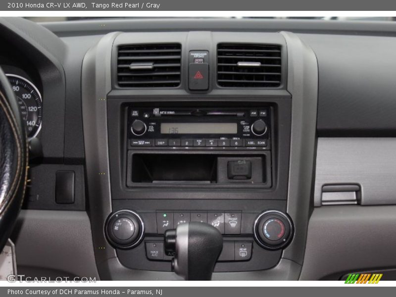 Tango Red Pearl / Gray 2010 Honda CR-V LX AWD