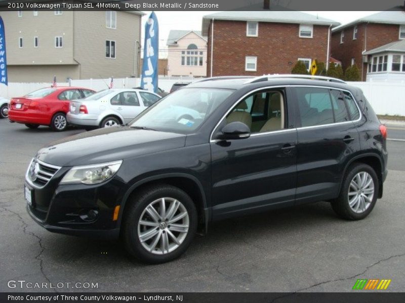 Deep Black Metallic / Sandstone 2010 Volkswagen Tiguan SEL 4Motion