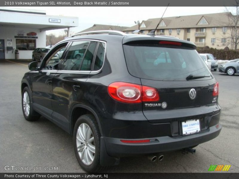 Deep Black Metallic / Sandstone 2010 Volkswagen Tiguan SEL 4Motion