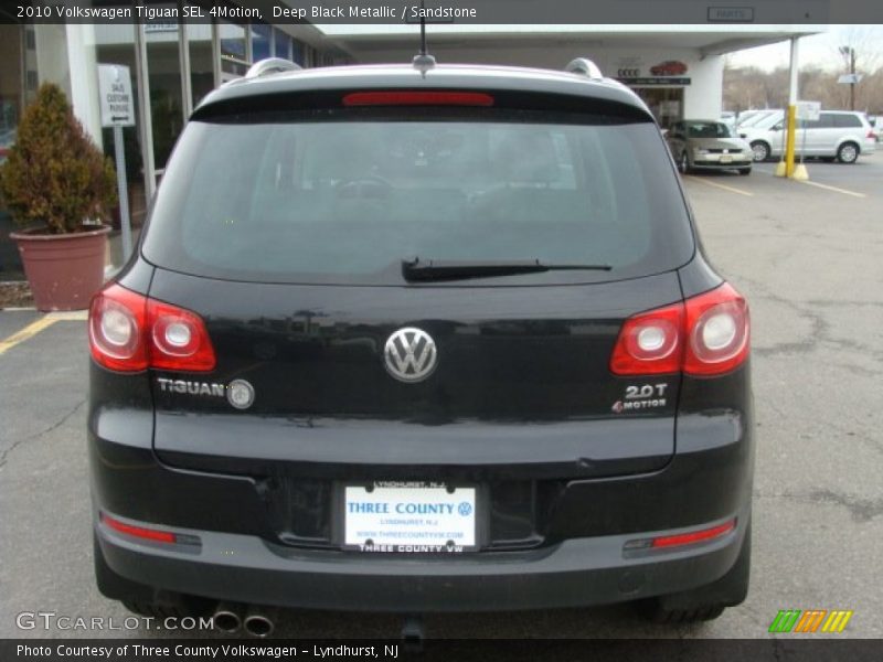 Deep Black Metallic / Sandstone 2010 Volkswagen Tiguan SEL 4Motion