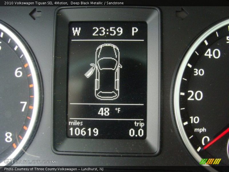 Deep Black Metallic / Sandstone 2010 Volkswagen Tiguan SEL 4Motion