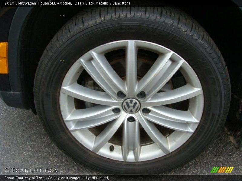 Deep Black Metallic / Sandstone 2010 Volkswagen Tiguan SEL 4Motion