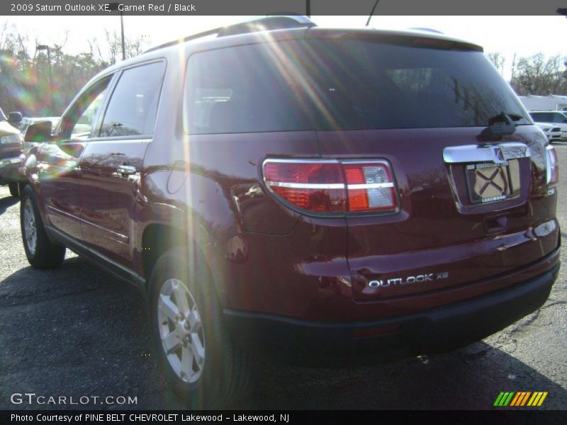 Garnet Red / Black 2009 Saturn Outlook XE