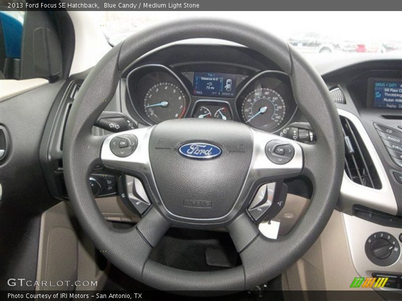 Blue Candy / Medium Light Stone 2013 Ford Focus SE Hatchback