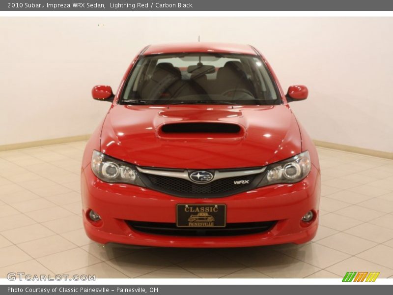 Lightning Red / Carbon Black 2010 Subaru Impreza WRX Sedan