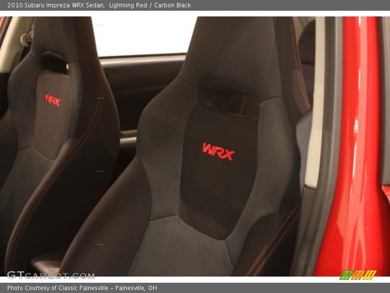 Lightning Red / Carbon Black 2010 Subaru Impreza WRX Sedan