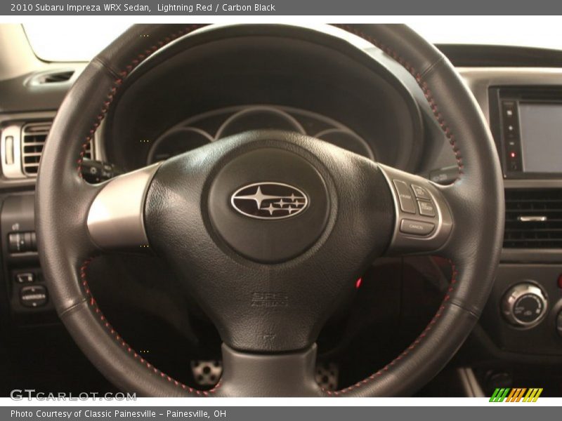 Lightning Red / Carbon Black 2010 Subaru Impreza WRX Sedan
