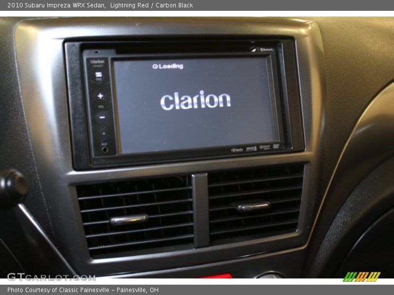 Lightning Red / Carbon Black 2010 Subaru Impreza WRX Sedan