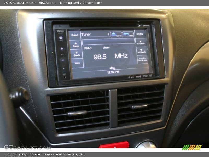 Lightning Red / Carbon Black 2010 Subaru Impreza WRX Sedan