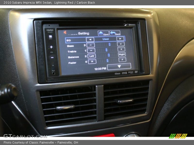 Lightning Red / Carbon Black 2010 Subaru Impreza WRX Sedan