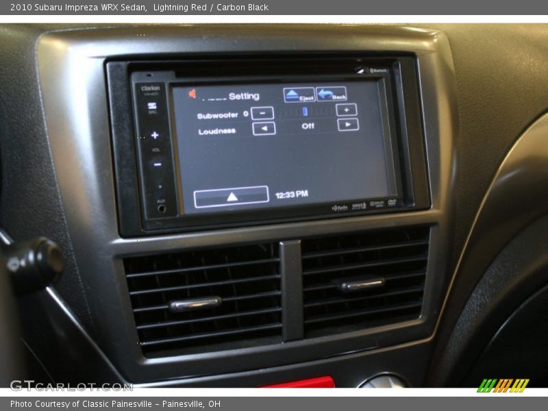 Lightning Red / Carbon Black 2010 Subaru Impreza WRX Sedan