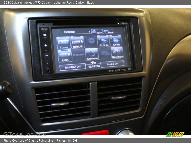 Lightning Red / Carbon Black 2010 Subaru Impreza WRX Sedan