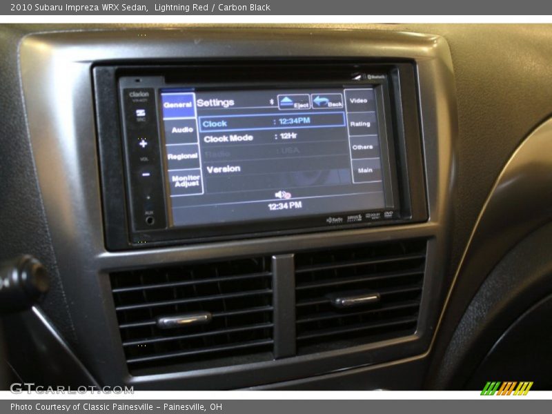 Lightning Red / Carbon Black 2010 Subaru Impreza WRX Sedan