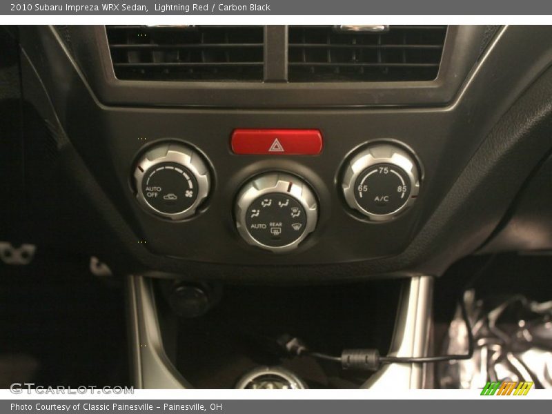 Lightning Red / Carbon Black 2010 Subaru Impreza WRX Sedan