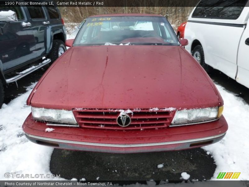 Garnet Red Metallic / Red 1990 Pontiac Bonneville LE