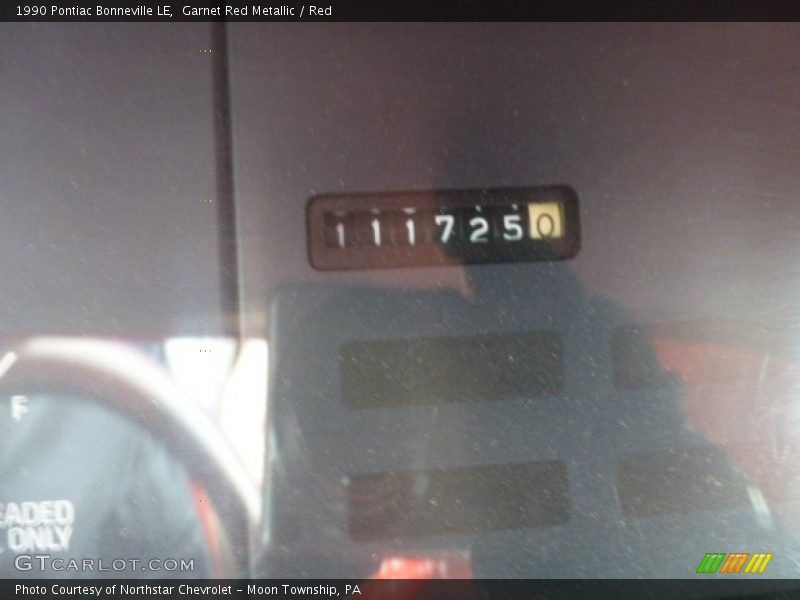 Garnet Red Metallic / Red 1990 Pontiac Bonneville LE