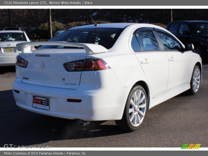 Wicked White Metallic / Black 2010 Mitsubishi Lancer GTS