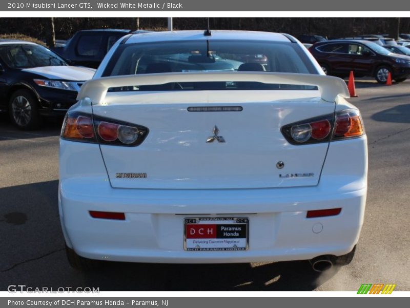 Wicked White Metallic / Black 2010 Mitsubishi Lancer GTS