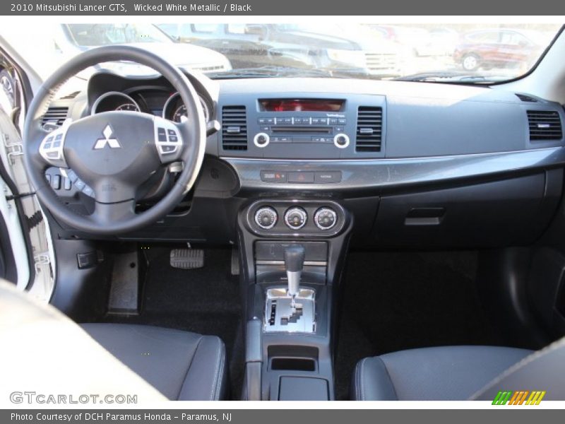 Wicked White Metallic / Black 2010 Mitsubishi Lancer GTS