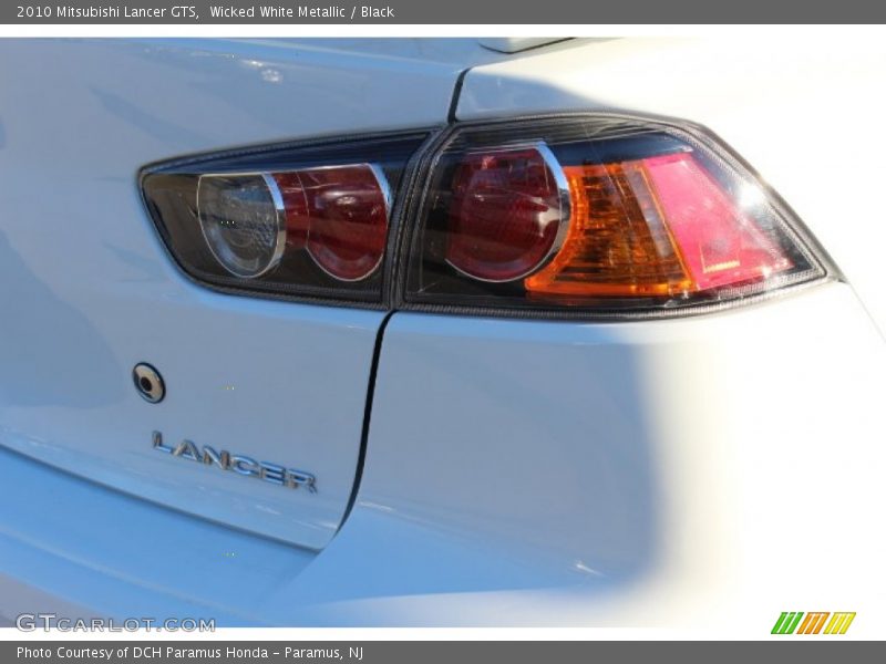 Wicked White Metallic / Black 2010 Mitsubishi Lancer GTS