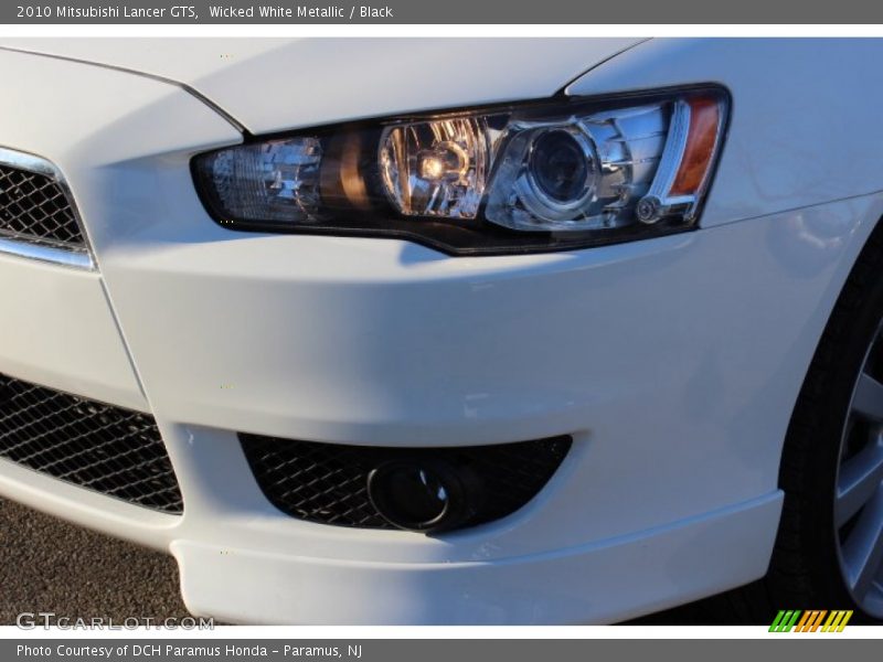 Wicked White Metallic / Black 2010 Mitsubishi Lancer GTS