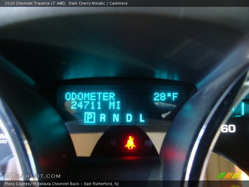 Dark Cherry Metallic / Cashmere 2010 Chevrolet Traverse LT AWD