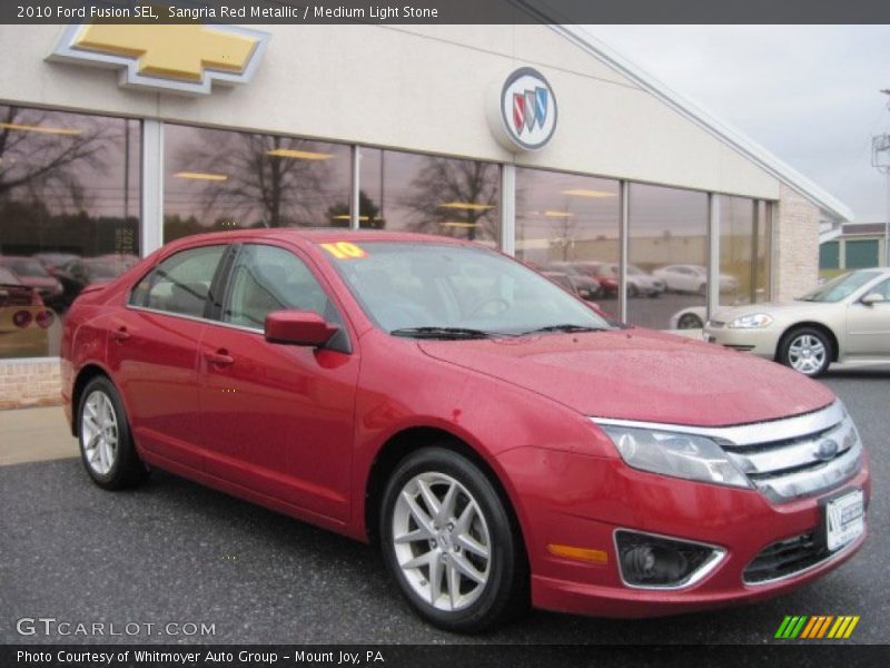 Sangria Red Metallic / Medium Light Stone 2010 Ford Fusion SEL